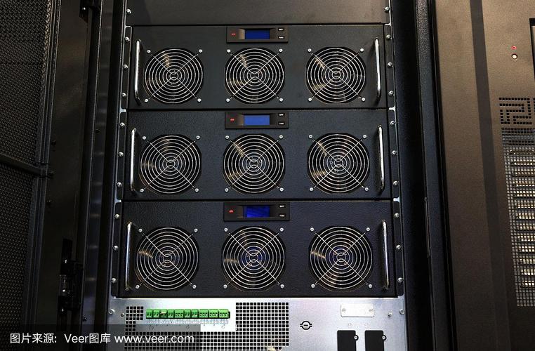 A technician working on a row of ASIC miners in a hosting facility.